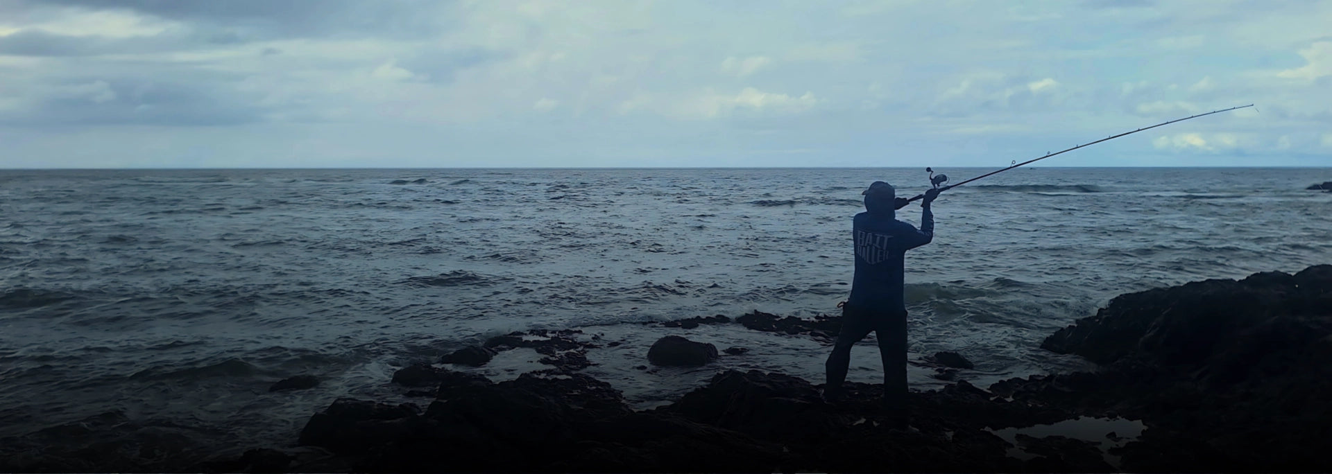 Angler casting timber handmade fishing lure from the racks in Panama.