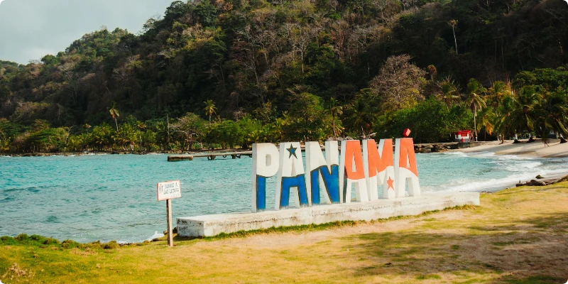 Panama sign on tropical beach.